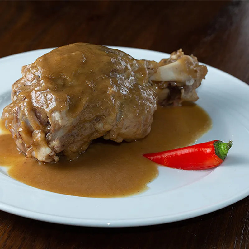 Stinco di maiale con birra e mele — Unni Don Nino - Osteria Bar, Sant'Angelo di Brolo (foto 1)