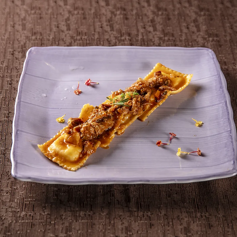 Ravioli al ragù di coniglio ripieni di burrata — La Badia, Ficarra (photo 1)