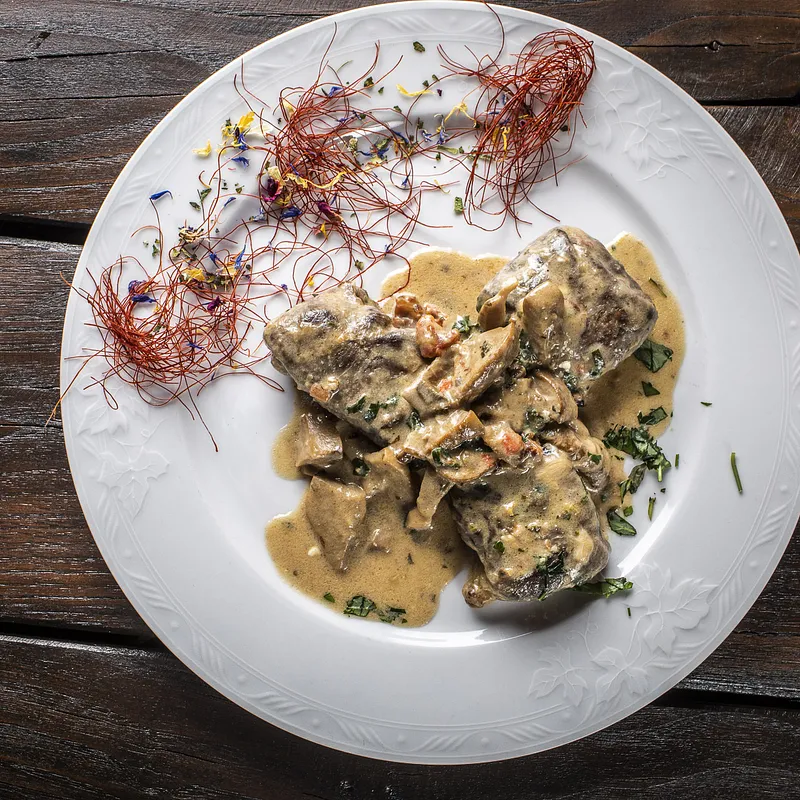 Tasca di vitello ai funghi porcini — Osteria della carne, Sant'Angelo di Brolo (foto 1)